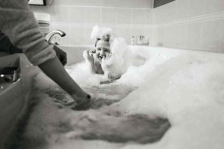 A Child In A Bubble Bath