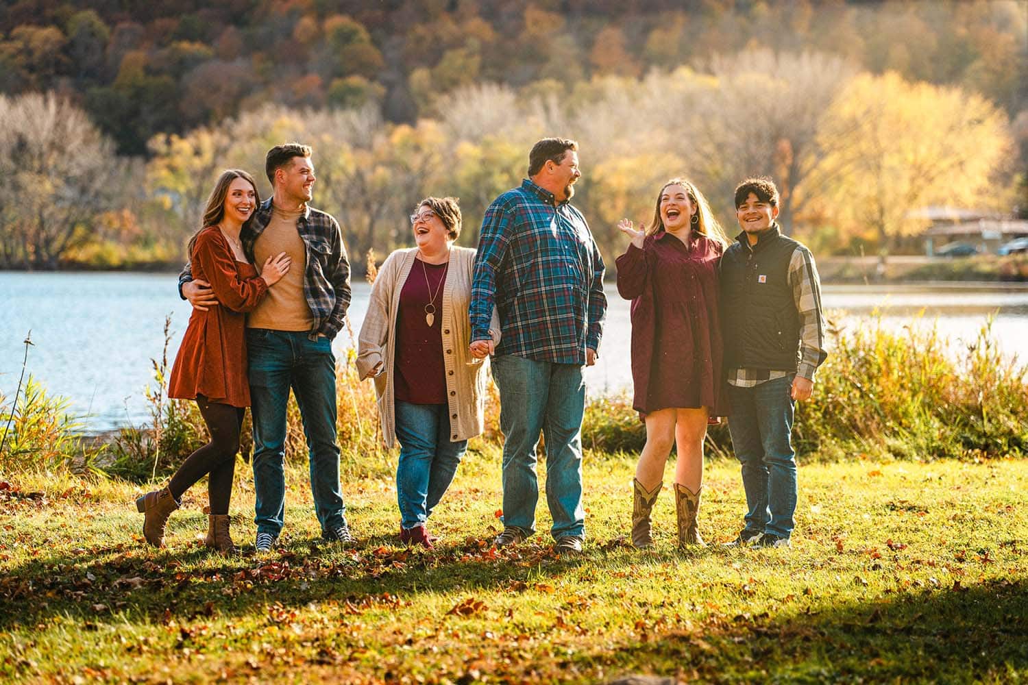 Adirondack Photography A Family Poses For A Photo By The Lake.