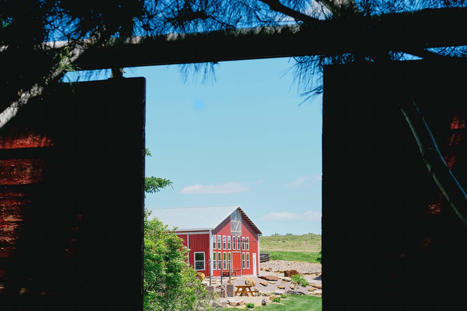 Adirondack Photography A Red Building Seen Through A Window