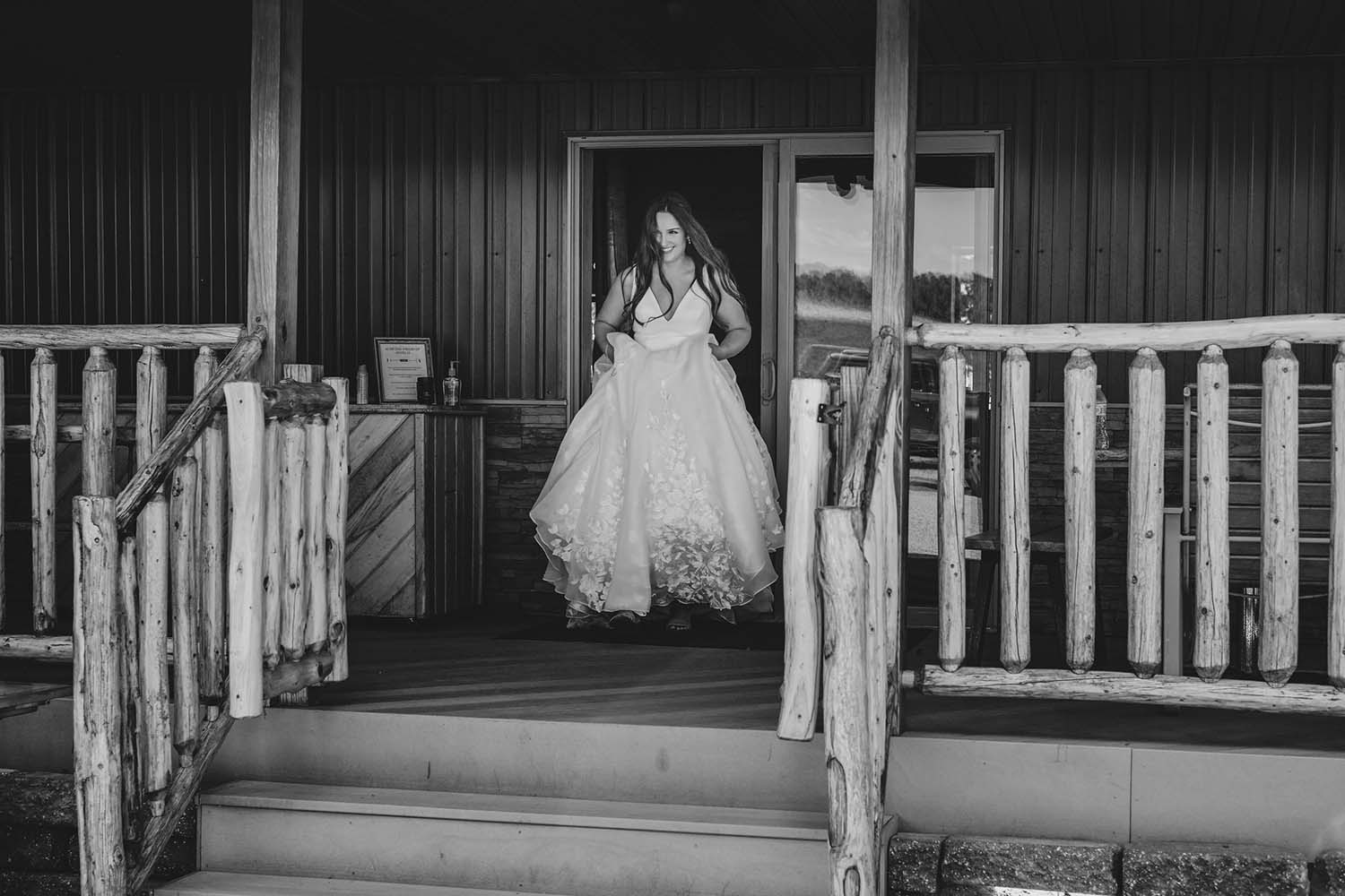 Adirondack Photography A Bride Walking Down The Stairs To The Porch.